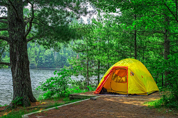 Lost Lake campsite, Voyageurs National Park, Minnesota, USA. An image of a back country campsite in Voyageurs National Park, Northern Minnesota, USA. tent stock pictures, royalty-free photos & images