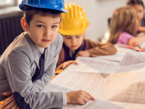 istock Little architects planning in the office. 485616940