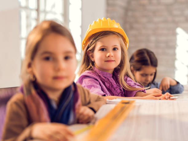 istock Group of children engineers working in the office. 485616950