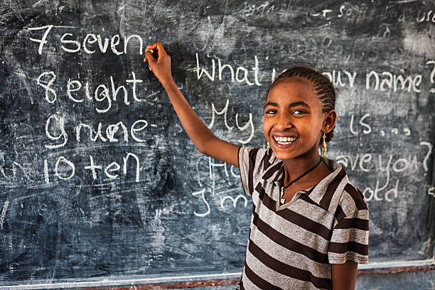 istock African little girl is learning English language 485617446