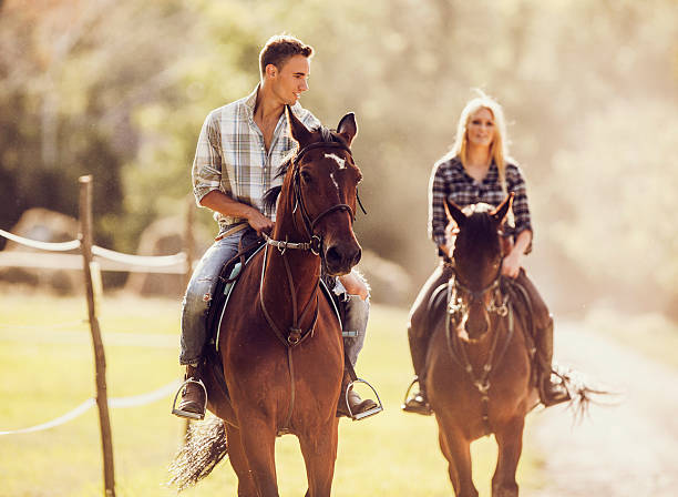 istock Young couple riding horses in nature. 485618668