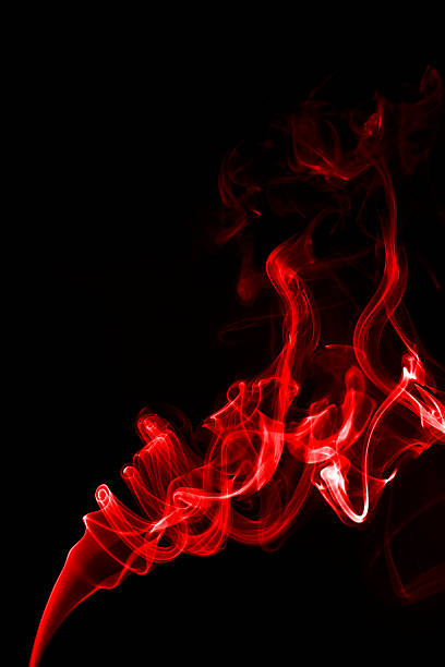 istock Red smoke on black blackground 485623786