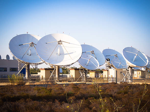 teleport satellite communications teleport satellite communications. Group of antennas in teleport of Cagliari Sardinia, Italy parabola stock pictures, royalty-free photos & images