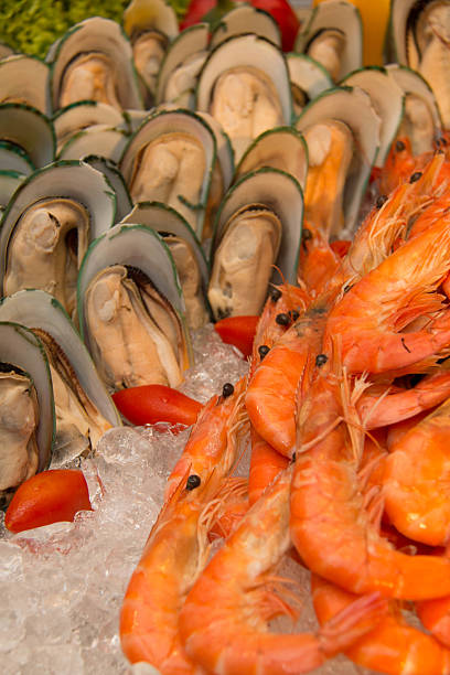 istock Mussels and shrimp on ice 485629180