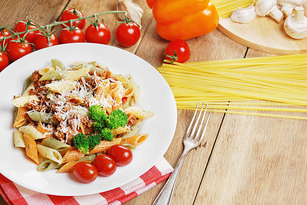 istock Pasta bolognese on the wooden table 485629547