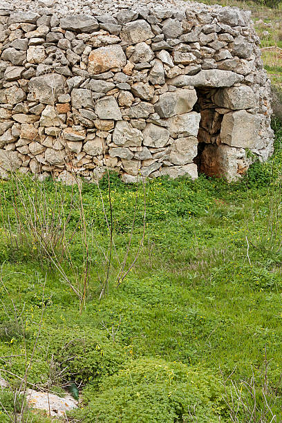 istock stone beehive huts/houses found on Malta 485630098