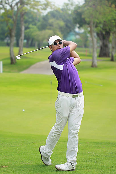 istock Asian golfer finish swing 485631691