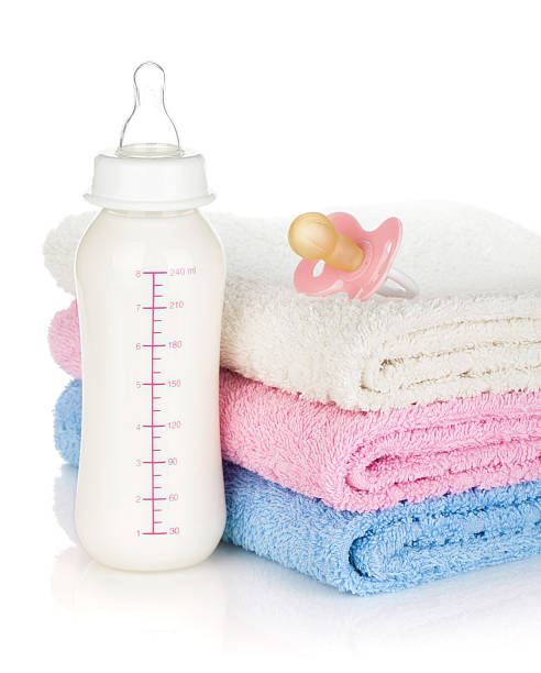 istock Baby bottle, pacifier and towels 485632543
