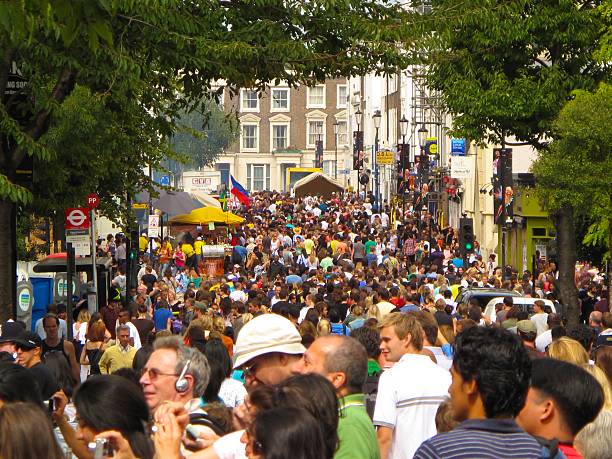 London, UK - August 13, 2012: Crowds gather to dance, eat, and celebrate the Notting Hill Carnival.