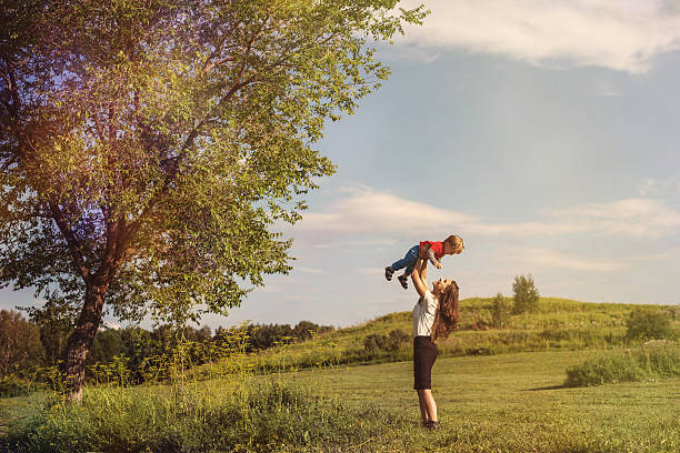 istock Business Woman Playing with Her Son 485633238