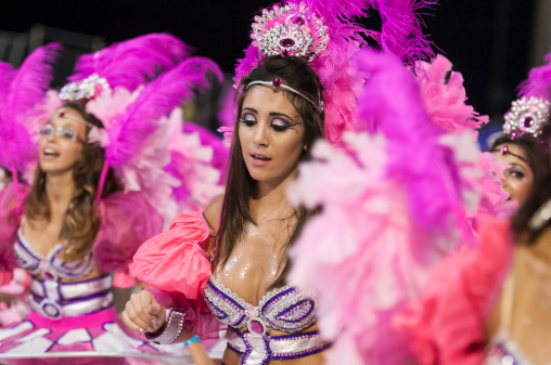 Florianópolis, Santa Catarina, Brazil - March 2, 2014: Members of a local samba school called Unidos da Coloninha, performing during the Carnaval of Florianópolis in downtown city