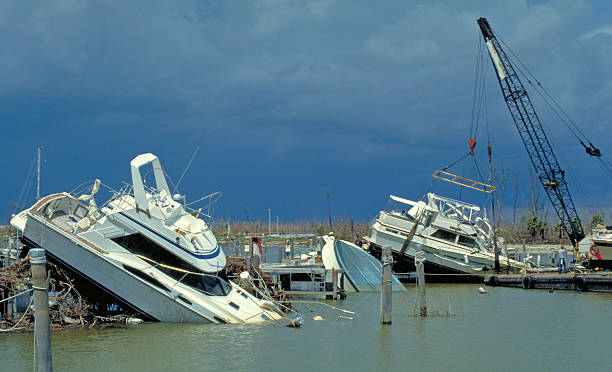 hurricane andrew damaged boats - hurricane florida stok fotoğraflar ve resimler