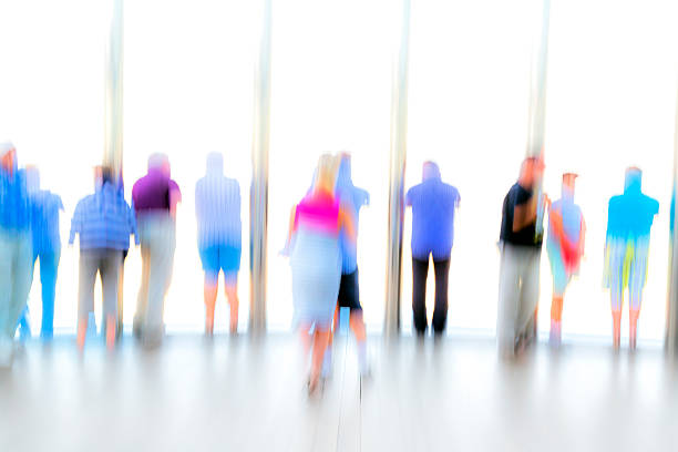 istock Large Group of Blurred, Unrecognizable People 485639054
