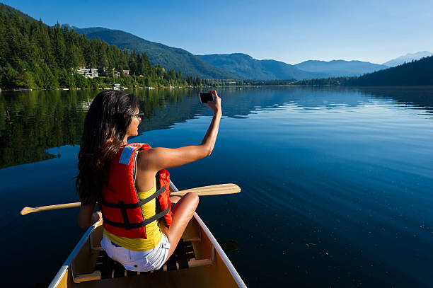 istock Female taking a selfie on a canoe tour 485639554