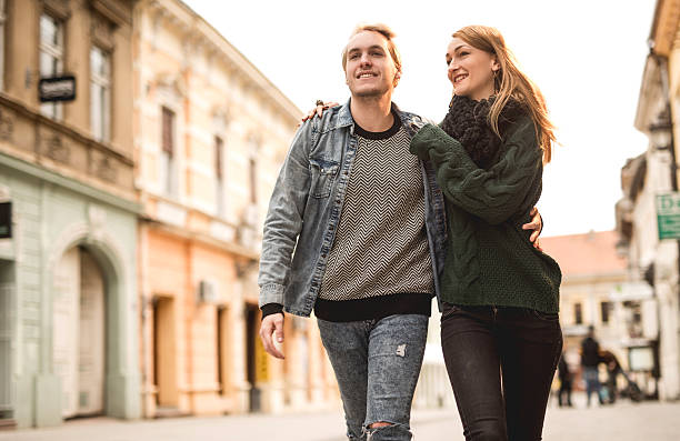 istock Young smiling couple taking a walk in the city. 485639746