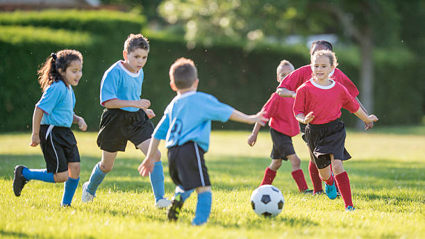 istock Kids in a Soccer Match 485640232