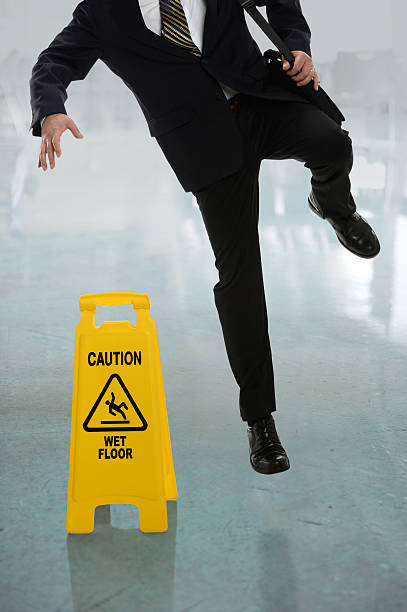 istock Businessman Slipping on Wet Floor 485651195