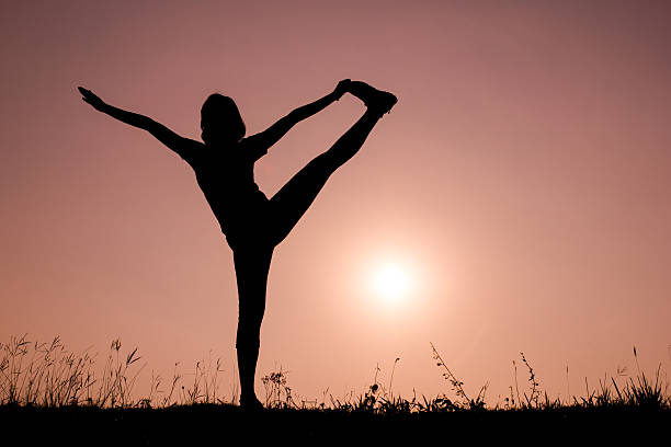 istock Silhouette woman with standing position yoga. 485652751