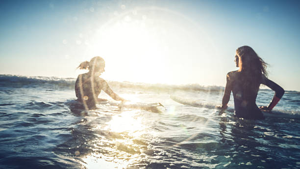 istock Surfer girls in action 485657990
