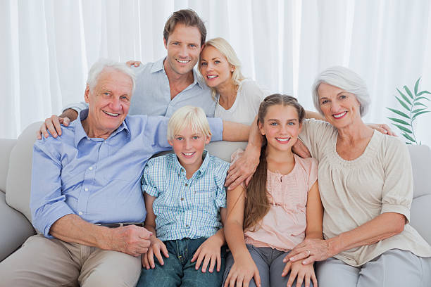 istock Extended family smiling at camera 485658413