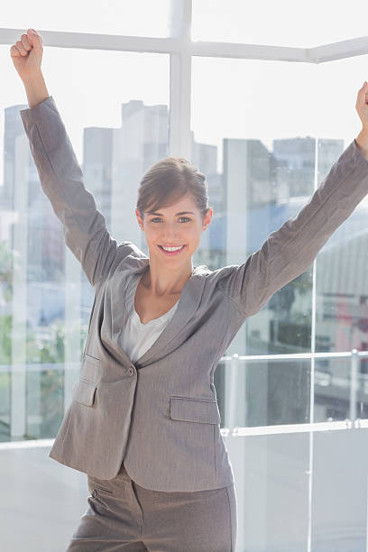 istock Successful businesswoman cheering and smiling 485658431
