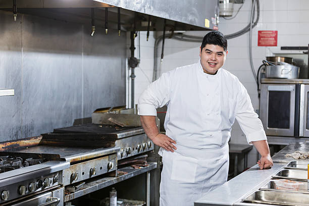 istock Asian chef in a commercial kitchen 485663214