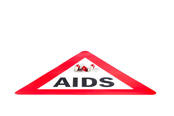 istock Stop AIDS and HIV, capsule with Warning Sign 485667786