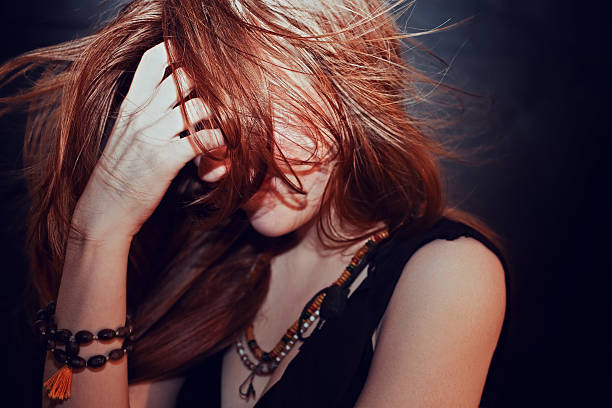 istock Red-haired young girl with hair fluttering 485670025