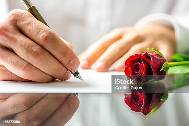 Romantic Man Writing A Love Letter Stock Photo - Download Image Now - 2015, Adult, Anniversary