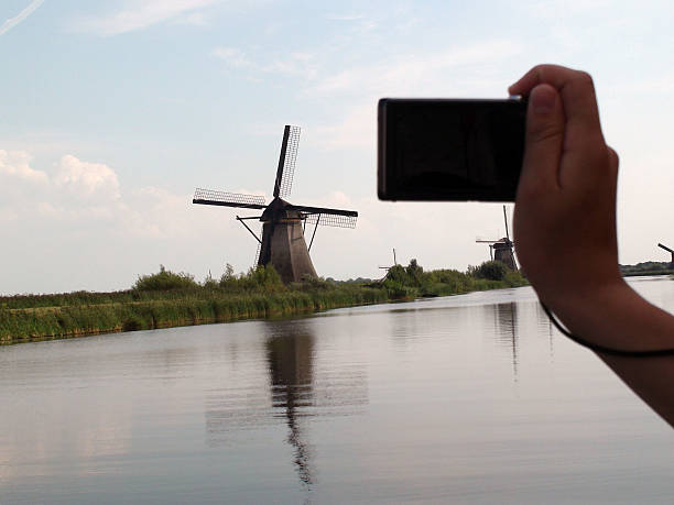 istock Hand Photographing Famous Kinderdijk Windmills In The Summer 485673006