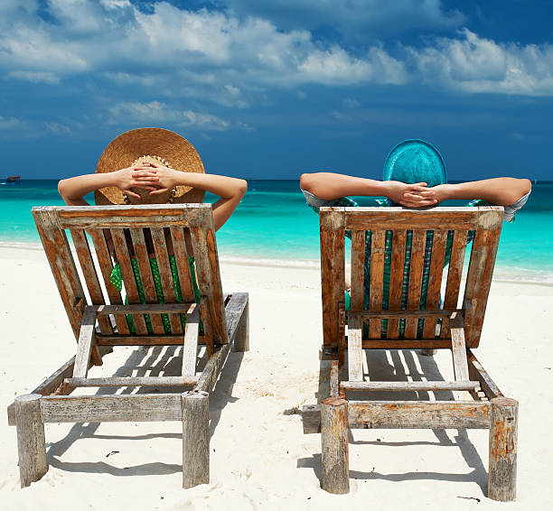 istock Couple in green on a beach at Maldives 485673073