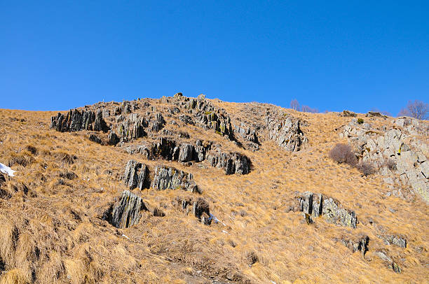 istock Caucasus mountain range in spring with snow and blue sky 485675235
