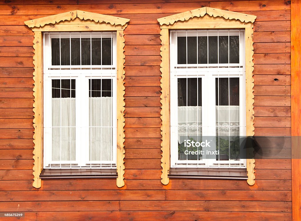 white window on red wooden wall Abandoned Stock Photo