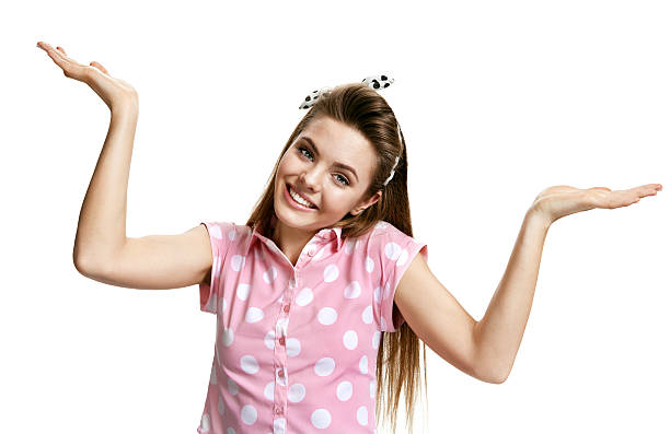 istock Happy smiling beautiful young woman with arms open 485676520