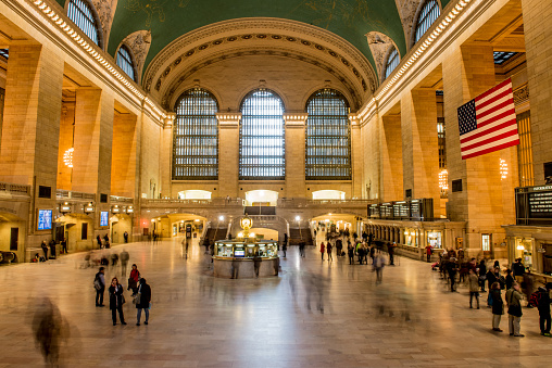 New York City, New York, USA - March 29, 2014: People moving inside the Grand Central Station of New York, in a morning of March.