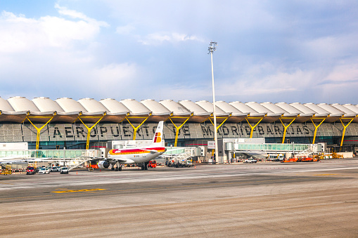 Madrid, Spain - April 1, 2012: New terminal T4 at Barajay Airport   in Madrid, Spain. In 2010, over 49.8 million passengers used Madrid-Barajas, making it the countrys largest airport.