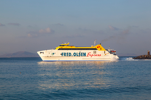 Playa Blanca, Spain - April 1, 2012: the ferry Bocayna Express from Fred Olsen in the harbor in Playa Blanca, Spain. Fred Olsen connects Lanzarote with Fuerteventura since 1962 with his line.