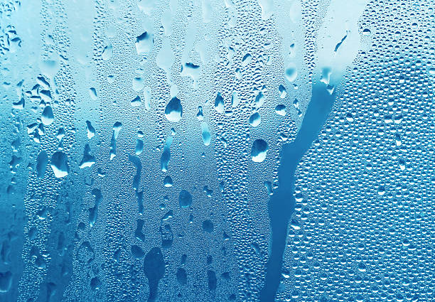 istock Natural water drops on glass 485677179