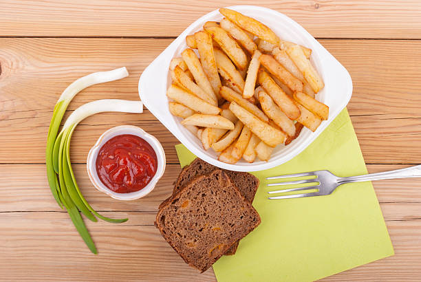 istock French fries on a plate on the table. 485677267