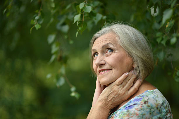 istock Senior woman in summer park 485679902