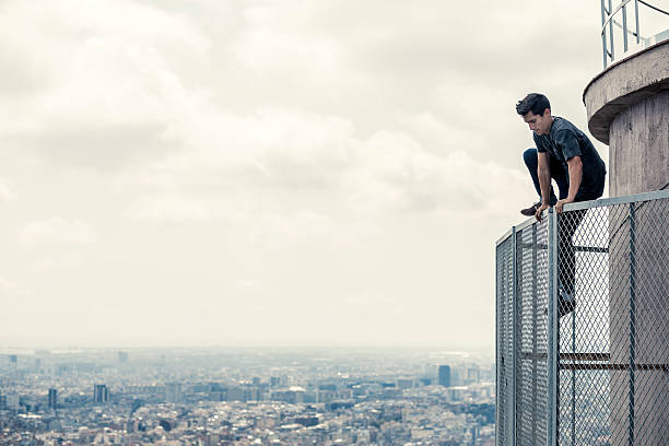 istock Young man practicing parkour in the city 485681684