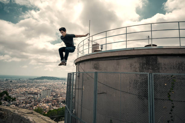 istock Man jumping and practicing parkour in the city 485681716