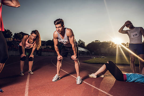 istock Group of exhausted young athletes finished their race. 485681736