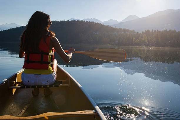 istock Canoeing on a prisitine mountain lake 485684918