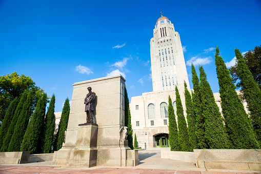 The Nebraska State Capitol Building with the statue of Abraham Lincoln which was dedicated in 1912.