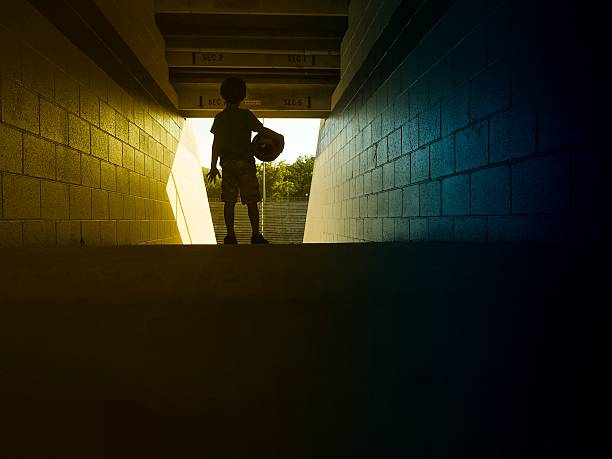 little boy holding サッカーボールのスタジアム - brazil stadium maracana stadium sport ストックフォトと画像