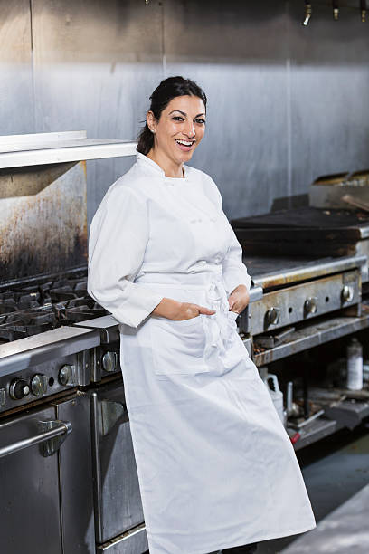istock Female chef in a commercial kitchen 485687394