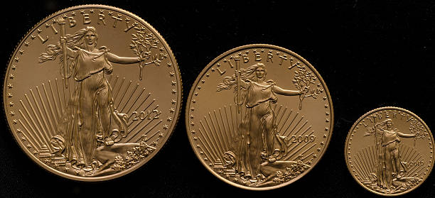 istock American Gold Eagles Small, Medium Large Black Background 485691538