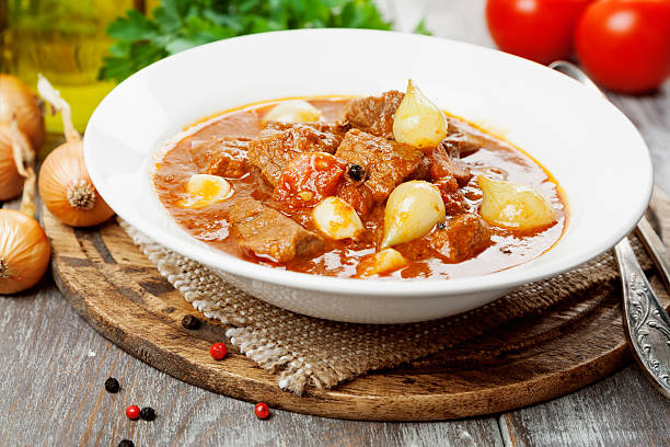 istock Stewed beef with onions and tomatoes, stifado 485698460