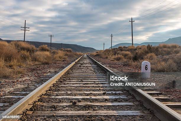 Railroad Tracks Stock Photo - Download Image Now - Cable, Cloud - Sky, Horizontal
